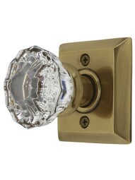 Quincy Rosette Door Set with Astoria Crystal Glass Knobs in Antique Brass.